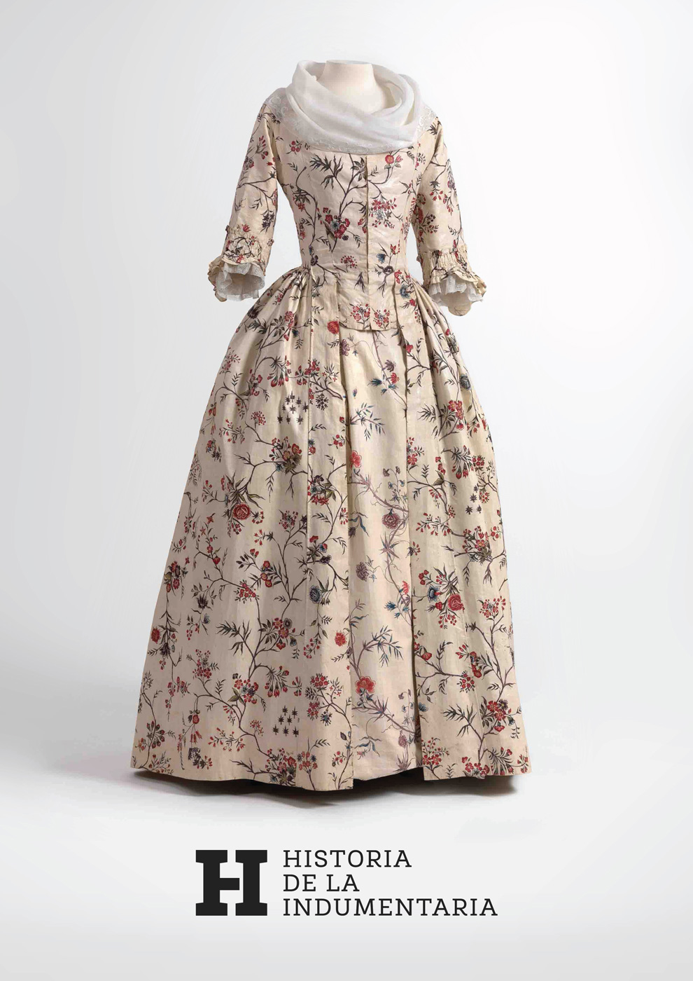 Aplicación de la marca sobre fotografía profesional de un vestido de mujer histórico